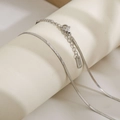 Detail of silver S925 snake chain necklace with lobster clasp on a display stand - 2mm Width 40cm Length / Silver