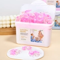 Pink 5D laundry beads in a white container for deep cleaning and long-lasting fragrance - 3-In-1 Crown Cherry Blossom Scent (50 Pods/Box)