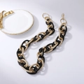 Gliederkette in Schwarz und Gold mit polierten Harz- und mattierten Metallelementen - Schwarz & Gold zweifarbige Kette