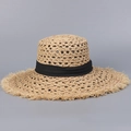Detail of raffia straw hat showing hollow weave texture and black ribbon with fringe edge - M (56-58cm) / Black