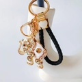 Detailed close-up of elephant keychain with crystal rhinestones and white enamel finish - Coffee with Heart Lanyard