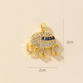 Detailed view of a gold elephant pendant with blue zircon stones and 2cm size measurement - 0369-4 (Blue Bar Zirconia)