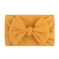 Soft mustard yellow nylon infant headband featuring a large knitted bow for baby girls - Earth Yellow