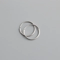 Minimalist S925 sterling silver hoop earrings shown from a top-down view on gray background - 16mm / White Gold