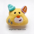Detail of yellow plush dog charm with colorful ears and 6cm height embroidery detail - Yellow Dog