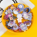 Cute space-themed acrylic cartoon brooches with astronaut and animal designs in a yellow tray - Bulk Discount (Default Brooch Style)