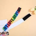 Rainbow gradient wig headband with LOVE lettering and adjustable magic tape fastener - LOVE Rainbow Print Black