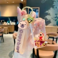 Pink Capybara bus liquid keychain with glitter, strawberry charm and golden bell - Capybara Bus - Purple