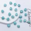 Light blue shell-shaped ceramic beads for DIY jewelry making and bracelet crafting - 12mm / Blue Howlite