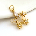 Detail of 18k gold plated star pendant with cubic zirconia on white ceramic plate - Gold Plated Copper/Zirconia / Gold Zirconia Star Flower (10)