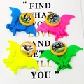 Set of four colorful bat-shaped puzzle maze toys in blue pink yellow and green - Bat Flying Disc