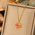 Elegant maple leaf necklace with red gemstone pendant on gold chain and velvet box - Red Gem Maple Leaf
