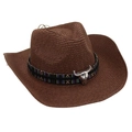 Close-up of brown straw cowboy hat with black patterned band and silver bull head emblem - Coffee
