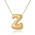 Detailed view of 3D rounded gold letter Z pendant necklace with polished finish - Z (D1013)