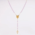 Close-up of golden rosary necklace featuring light purple faceted crystal beads and cross - Lavender