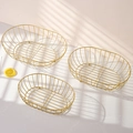 Three-piece set of gold iron wire baskets in oval design for fruits and storage - Three-Piece Set / Gold