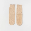 Beige yoga socks for women with ruffled cuffs and non-slip silicone grips on sole - One Size / Nude