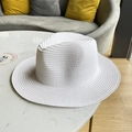 Classic white woven wide brim Panama hat for sun protection and beach vacation styling - White
