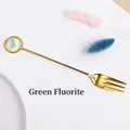Golden creative dessert fork featuring a long handle with natural green fluorite crystal - Green Fluorite Fork - Gold