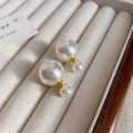 Detailed macro view of vintage-style double-sided pearl earrings with gold accents - White Double Pearl Style (10#)