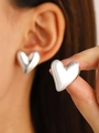 Minimalist silver heart-shaped stud earring with polished metallic finish for women - Glossy Silver (7354)