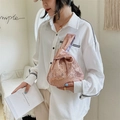 Schicke Pailletten-Handtasche in Roségold mit Knotengriff für einen modischen Damen-Look - Champagnergold