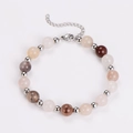 Detailed shot of agate beaded bracelet with adjustable silver lobster clasp on white background - Bracelet / Steel