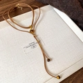 Detail of double-layer necklace with tiger eye beads and golden clasp on warm fabric - Double Layer Pendant Rope Style (27#) / Brown