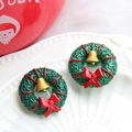 Close-up of Christmas wreath donut charm with golden bell and red bow decoration - Wreath-Gold Bell