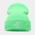 Detail of neon green knitted beanie featuring silver DON'T FORGET TO SMILE embroidery - One Size / Fluorescent Green