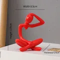 Modern red abstract thinker sculpture in sitting pose, resin craft home decor, 10.9cm height - Genius Club Red