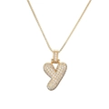 Close-up of golden bubble letter Y pendant necklace featuring sparkling zircon pave setting - Letter Y