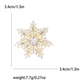 Élégante broche flocon de neige dorée avec cristaux, taille 3,4 cm et poids de 7,7 g - Doré