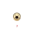 Macro shot of gold-plated stainless steel round bead with yawning emoji for DIY jewelry - Expression 7