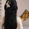 Detail of ethereal butterfly hair clip with iridescent wings and tassels on a black updo - 1# Crystal Butterfly Iridescent Hair Clip