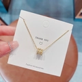 Collana in acciaio al titanio dorato con pendente cilindrico e cristalli bianchi - Forma Cilindrica Perla della Fortuna (X209) / Oro