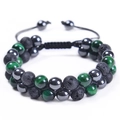 Macro detail of double-layer woven bracelet with blue tiger eye and lava stone beads - Green Tiger Eye & Lava & Hematite