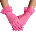 Close-up of rose pink lace gloves with floral patterns and ruffled wrist detail - One Size / Rose Red