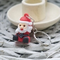 Cute Santa Claus soft rubber keychain with red and white festive silicone details - Small Christmas Soft Glue Keychain Sitting Santa