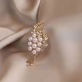 Elegant gold flower brooch with white pearls and rhinestones on silk background - Tulip #524