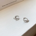 Minimalist silver double-layered heart buckle ear clips displayed on a white textured surface - Style 1714 Heart Belt Ear Clips - Pair