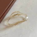 Pince à cheveux élégante transparente couleur champagne au design irrégulier en résine ondulée - Pince à cheveux nuage / Jaune Transparent