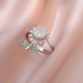 Silver sunflower ring with white cubic zirconia petals and green emerald accents - Sunflower Ring / Silver
