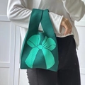 Deep green knit tote bag with light green bow pattern and soft knitted texture - Dark Green Bow