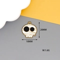 White enamel skull pendant charm in gold metal finish with 20x18mm dimensions - Mummy