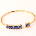Verstelbare gouden open armband met blauwe edelstenen en sprankelende zirkonia accenten - Blauwe Zirkoon Stijl 1