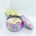 Scented soy candle in a floral tin with dried flower petals for home relaxation - D213 Tuberose