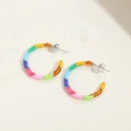 Detailed view of colorful enamel rainbow stripe C-shaped earrings on a beige textured background - Colorful C-Shaped (Large)