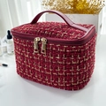 Deep red tweed cosmetic bag with gold accents and top handle in rectangle shape - Burgundy