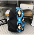 Detail of multi-color geometric ethnic pattern on black nylon laptop backpack - Single Bag / Black Spliced Blue